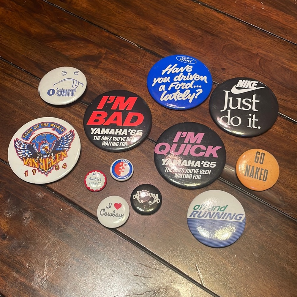 Lot of 12 vintage advertising buttons pins
